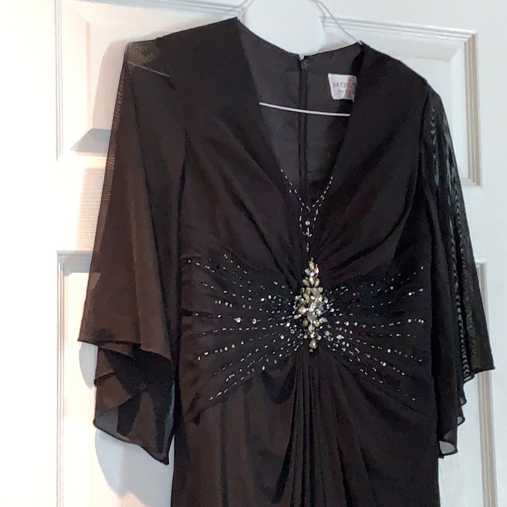 Beautiful montage by mon Cheri gown